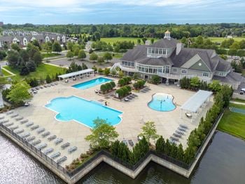 an aerial view of the resort style pool and spaat The Harbours Apartments, Clinton Twp, MI, 48038